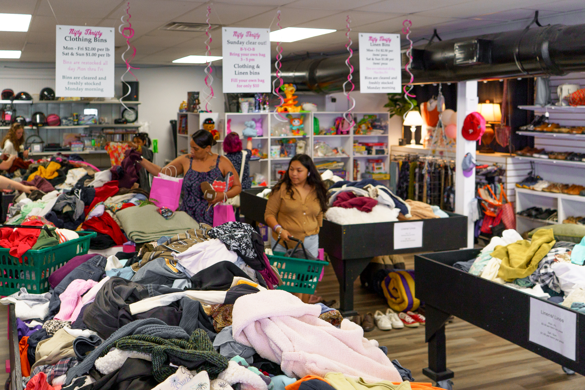 Customers shopping the bins at Nifty Thrifty